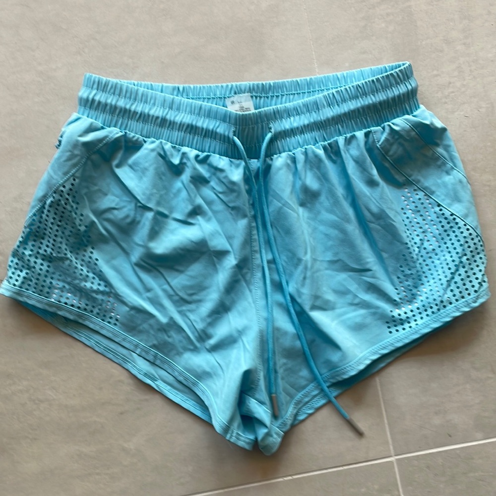 Women’s AS Revival athletic shorts, light blue, size medium, drawstring waist